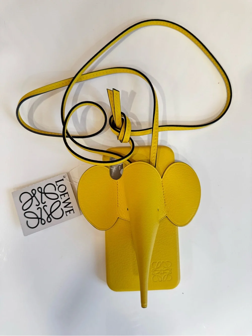 Loewe Leather yellow elephant Iphone case with strap.